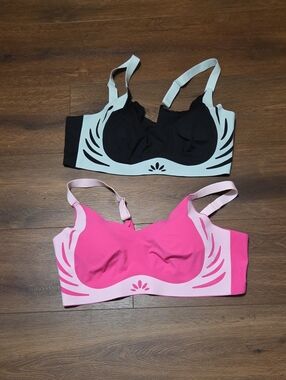 2 no brand name pink sports bra size 5X and blue/black sports bra size 5X